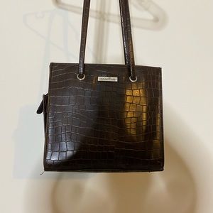 Selling this beautiful brown faux leather bag that was styled and loved !